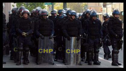 Riot Police in full gear; helmets, shields, bullet proof vests, etc.