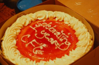 Picture of Round Cake with Icing that says "Celebrating 1 year CFC"